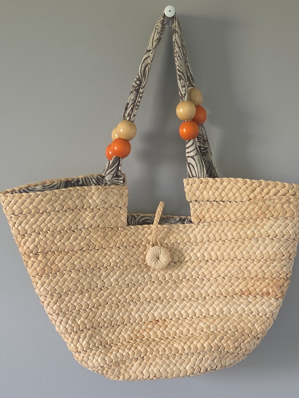 AHAVA Corn Husk Tote with Orange Accent Beads Drawstring Closer Inside